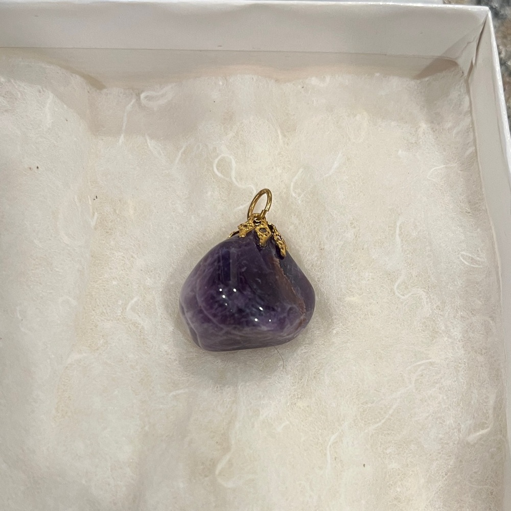 Purple stone for a necklace